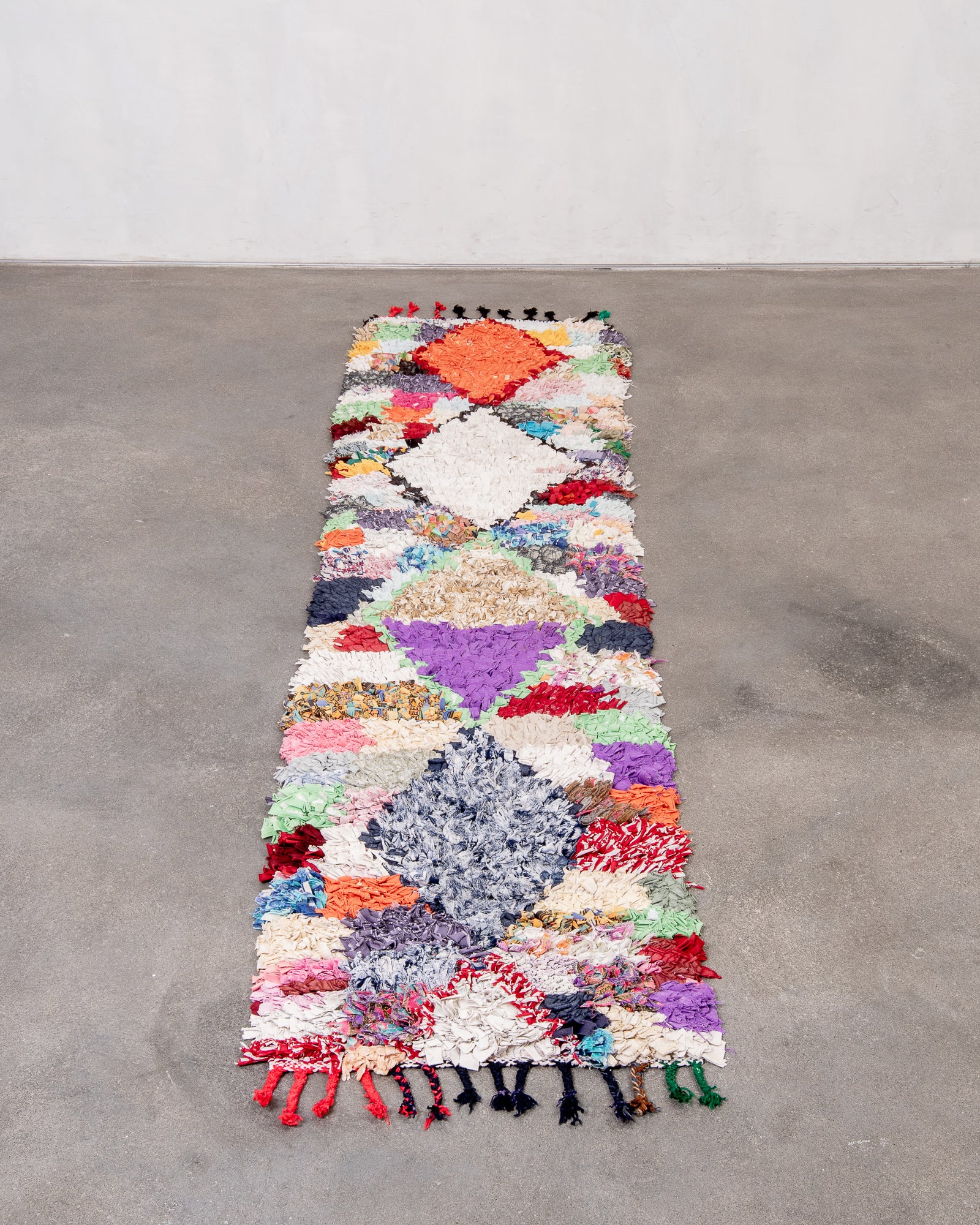 Modern designer handcrafted cotton Berber rug from Morocco. Boucherouite with beautiful colors and patterns.